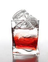Ice in red cocktail