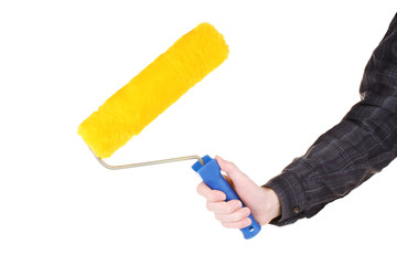 bright paint roller in hand isolated on white