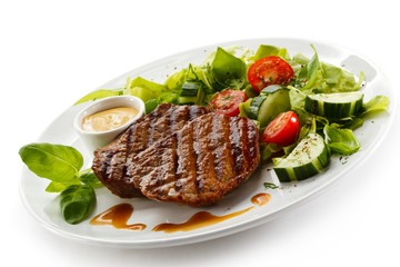 Grilled steaks and vegetables