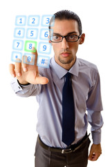 Businessman pressing virtual buttons