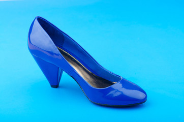 Woman shoes in the fashion concept