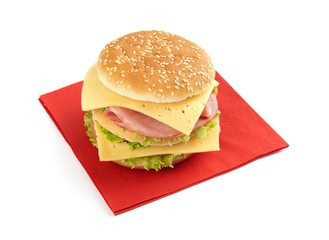 sandwich with lettuce, ham, cheese and tomato