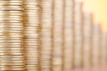 Golden coins in high stacks