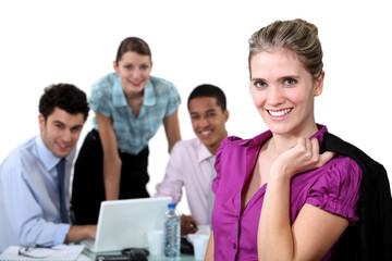 Fototapeta premium young executive woman and teamwork in background