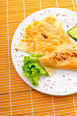 Pancake with pumpkin in plate