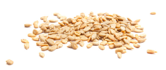 Fototapeta premium handful of cleaned salted sunflower seeds isolated on white back