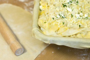 Cooking the Turkish pie with cheese