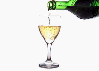 white wine poured into glass