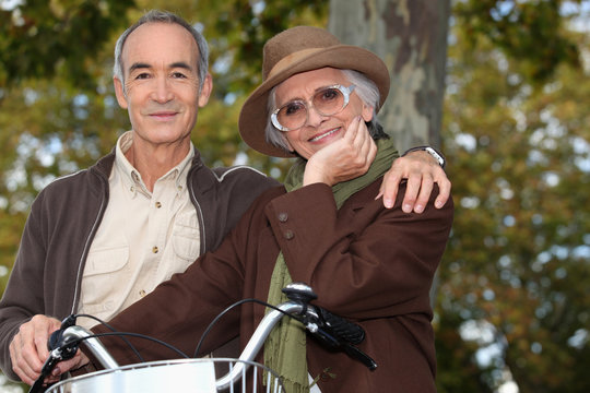Older couple with a bicycle