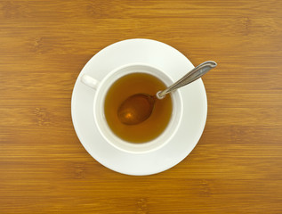 Ginseng tea with spoon on tabletop