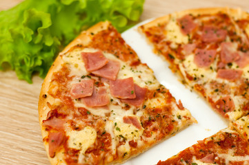 Appetizing pizza with ham