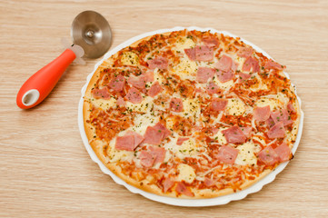 Appetizing pizza with ham