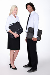Business executives with briefcases