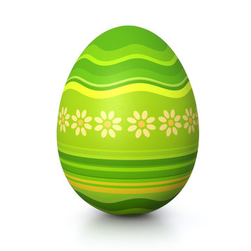 Green painted easter egg with flower pattern