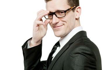 Handsome businessman in black suit on white.