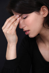 Fototapeta premium Woman with a headache