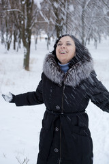 Fototapeta na wymiar woman throw up snow 2