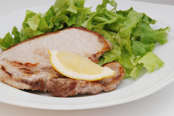 braciola di suino con insalaata