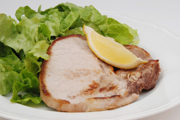 braciole di suino con insalata