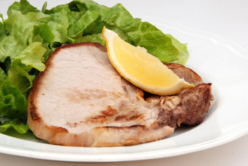 braciola di suino con insalata