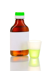 Medical bottle and jigger isolated on white