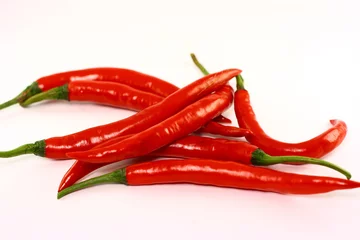 Fotobehang pile of red chilli pepper © airdone