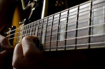 Playing electric guitar