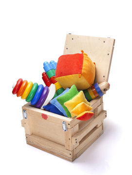 wooden box with many toys