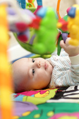 Baby on playing mat