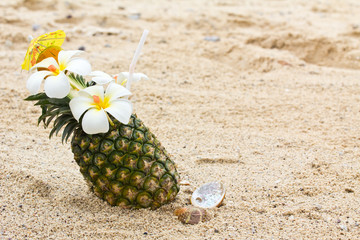 Pineapple cocktail on the beach