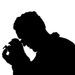 man looking through a magnifying glass