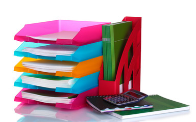 bright paper trays and stationery isolated on white