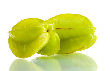 two fresh carambola fruits isolated on white