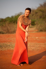 Beautiful girl dressed  terracotta dress