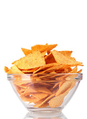 tasty potato chips in transparent bowl isolated on white