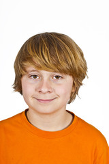 happy smiling boy in orange shirt