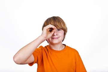 happy smiling boy in orange shirt