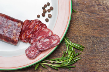 salami on wooden background