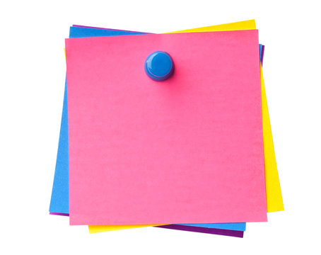Stack of colorful sticky notes pinned together isolated