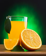 orange juice in a glass on a table