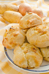 Knishes with potato and onions (Jewish pastry)