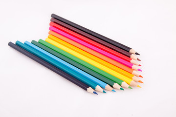 Fototapeta premium Color pencils on white isolated background