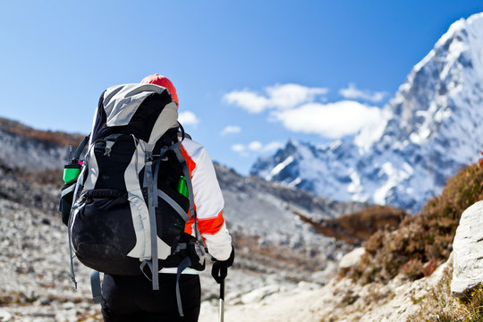 Woman trekking in Himalaya Mountains