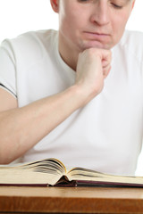 Man studying the Bible. Focus on the Bible