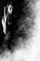 Sexy woman holding gun