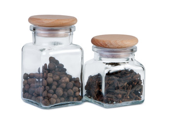 Jars of spices on a white background