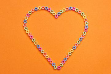 Plastic beads in the shape of a heart