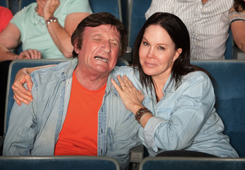 Woman Consoles Weeping Man
