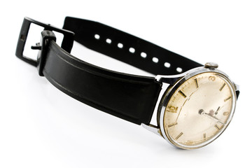 Old broken wristwatch with black strap