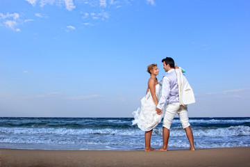 Couple at their beach wedding
